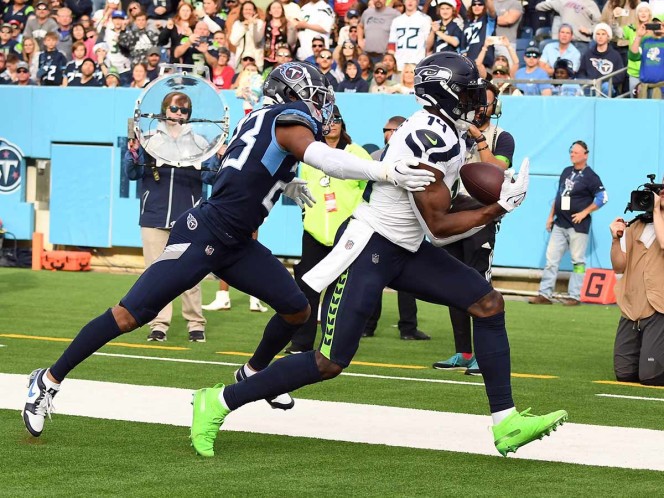«Playoffs en la Mira: Seattle Seahawks Vence a Titans»